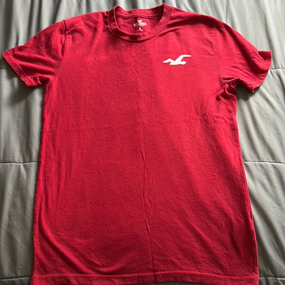 Red Hollister shirt.
